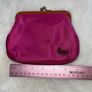 Dooney & Bourke fabric pink kiss lock closure coin purse. Slightly used
